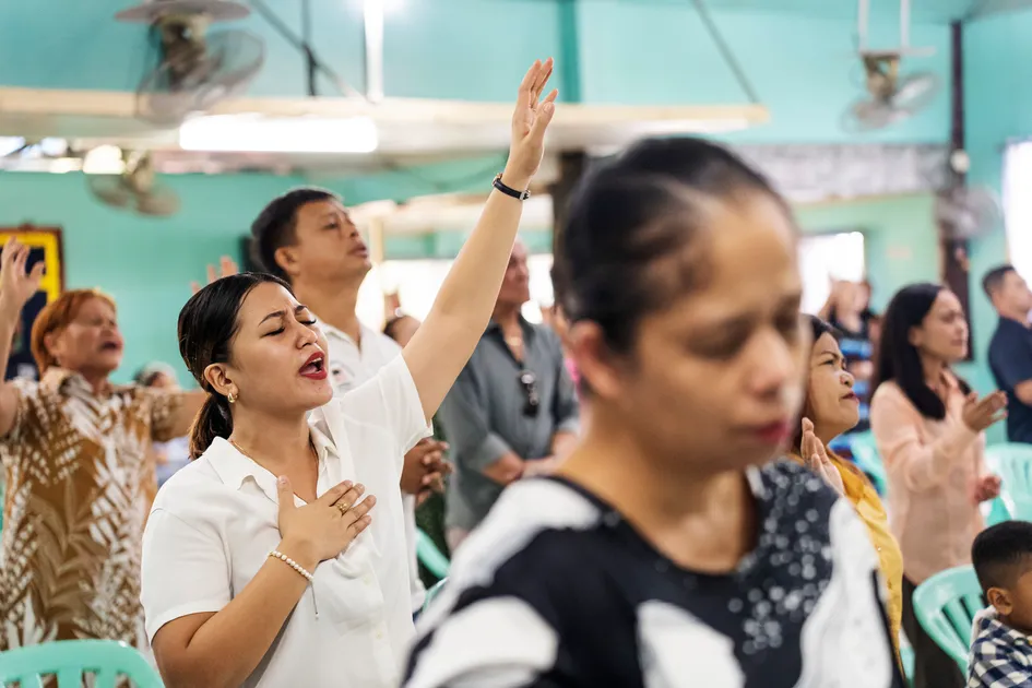 Worshippers sing out at a church in Cagayan de Oro, on the north end of the island of Mindanao.