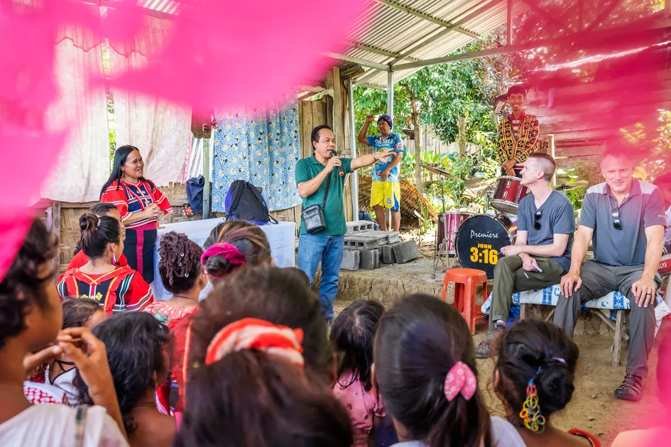 Pastor Alex greets the members of a church plant in a remote village on Mindanao, Philippines.