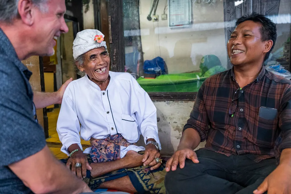 Joko, Mr. K’s son-in-law (right), introduces his friend, Greg Kelley (left) to the local high priest who recently decided to follow Jesus.